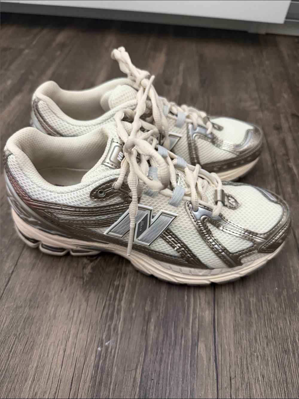 New Balance Women’s Cream and Metallic Silver Athletic Sneakers 1906